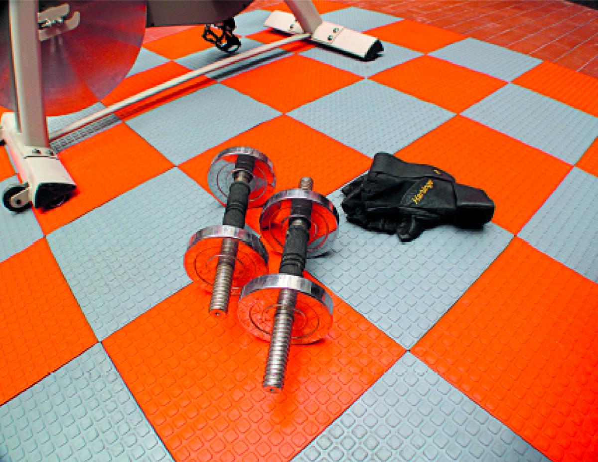 Piso en baldosas de Pvc para Gimnasios